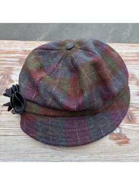 Mucros Weavers Newsboy Cap in Multi Plaid Wool with Black Flower Accent